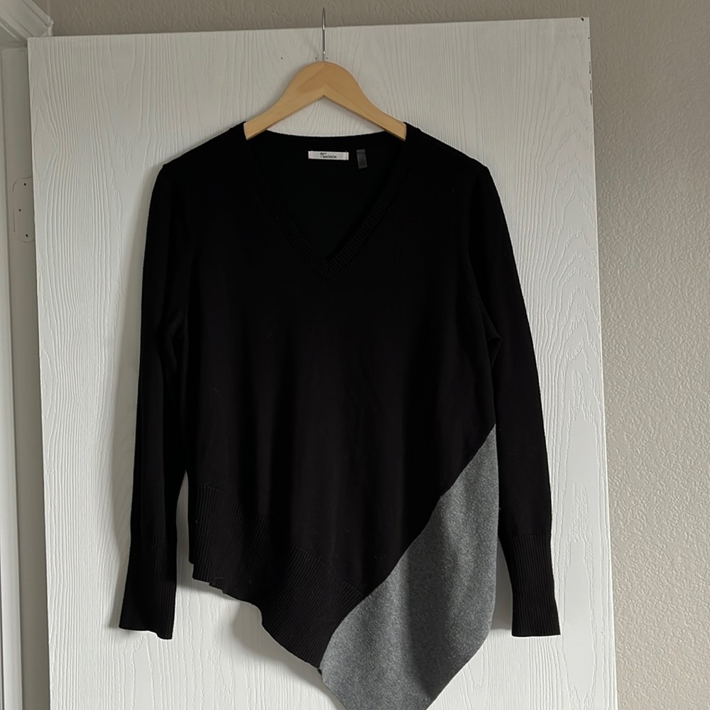 Asymmetrical light sweater